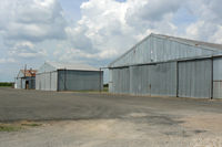  @ Cleburne Regional Airport - Older hangers at the north end of the field. at Cleburne Municipal - by Zane Adams