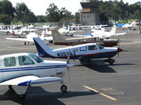  - N2051X/N3946J/N39944 running-up engines while tower lets stream of Cessnas come home - by Steve Nation