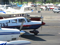  - N2051X/N3946J/N39944 running-up engines while tower lets stream of Cessnas come home - by Steve Nation