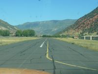  - Taking off runway 14 at Glenwood Springs - by Victor Agababov