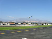  - This Bellanca 7ECA Citabria workhorse rental trainer on takeoff climb flies daily. - by Doug Robertson