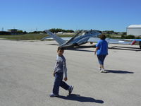  - Mr Dill and a freind looking at the Jets - Lago Vista Airport - by Zane Adams