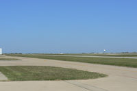  - Wide open spaces...looking north across the airfield...local Doppler RADAR dome on the east side of the field. - by Zane Adams