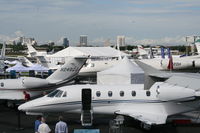  - Overview of NBAA taken from A319 with Downtown in background - by Florida Metal