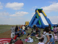  - Bounce House on the show/crowd line at the 2008 Alliance airshow ( I hate when they put this kind of stuff right up front...grrrr )  - by Zane Adams