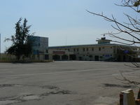  - Exterior of Cam Ranh airport. Looks derelict but isn't! - by John Grummitt