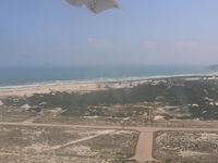  - Aerial view of runway after takeoff. - by John Grummitt