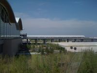  - Looking at Terminal 1 from Terminal 2. Rare blue sky in Shanghai - by Ken Wang