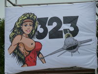  @ Leeuwarden Air Base Airport - Goddess of the hunters Diana is in the squadron-sign of Leeuwarden based 323 Squadron, this banner was high up during the Royal Netherlands Air Force open house - by Alex Smit