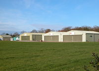  - PREMIAR HANGERS NORTH SIDE OF AIRFIELD - by BIKE PILOT