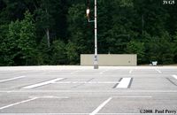  @ Thomas Nelson Community College Heliport - The parking-lot helipad and windsock. - by Paul Perry
