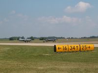  - runway signs snapped during the airshow...I don't normally get to stand here... - by IndyPilot63