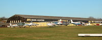  - PART OF THE AIRCRAFT PARK WITH THE ALAN MANN HANGERS IN THE BACK GROUND - by BIKE PILOT