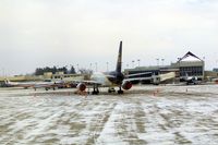  - Looking at the terminal from the tower's 2nd floor window.  UPS is parked while two Eagle Flights are parking - by Glenn E. Chatfield