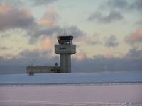  @ Keflavík International Airport (Flugstöð Leifs Eiríkssonar) - Control Tower at Keflavik on the shortest day of the year. Sunrise 1120; Sunset 1532. - by John J. Boling
