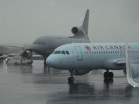  - Another picture of the RAF Tristar as an Air Canada aircraft taxis to the gate at YHZ - by YHZAirplaneSpotter