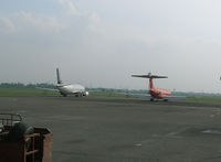  @ Soekarno-Hatta International Airport - Waiting repair at Jakarta - by John J. Boling