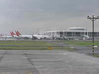  - Terminal 2 at Manila - by John J. Boling