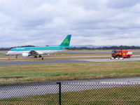  - Aer Lingus A320 EI-DVE being followed to the terminal by a fire truck - by Chris Hall