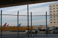  - Rest House Hotel (right) is right on the airport perimeter - by Terry Fletcher