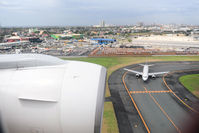  @ Ninoy Aquino International Airport - On final approach, just before landing .. within airport perimeter. - by BigDaeng