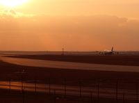  - Cathay Pacific after touch down in the sunset - by Florian Seibert