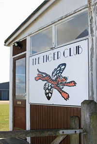  - Sign on the side of the famous Tiger Club Hut. - by Martin Browne