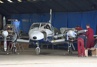  - A peek inside the maint hangar at Headcorn. - by Martin Browne