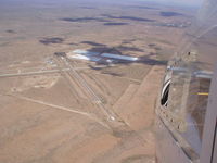  - aerial view of Marfa Municipal Airport before runway resurfacing. - by unknown