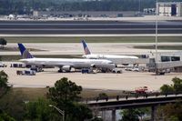  - Airside One with Continental jets at MCO - by Florida Metal