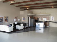  - Very deluxe large entertainment and showplace hangar-furnished kitchen, bar, bath and lounge-available.  - by Doug Robertson