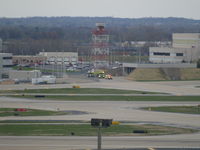  @ TL - EMERGENCY VECHICLES HEADING TO RUNWAY - by Gary Schenaman