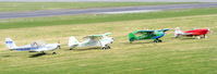  - Visitors at the Easter Wings and Wheels Charity fly in at Halfpenny Green - by Chris Hall