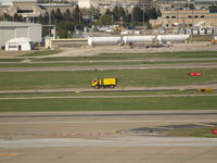  - OOPS TRUCK ON RUNWAY - by Gary Schenaman