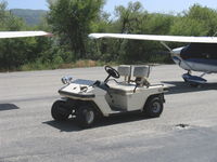  - Typical airport cart, but 'soundly' equipped! - by Doug Robertson