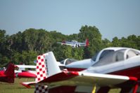  - Rides in a P-51 (N10601) at Sun N Fun 2009 - Lakeland, Florida - by Bob Simmermon