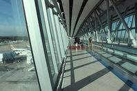  - On the footbridge at the North Terminal. - by Andrew Simpson