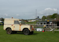  - AIRFIELD LAND ROVER IN FRONT OF THE CLUB HOUSE, I THINK THE ORANGE DAY-GLO'S FADED A TAD ! - by BIKE PILOT