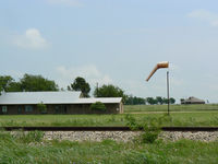  @ Aresti Aerodrome Airport - Aresti Aerodrome - Windsock and one residence/hanger - by Zane Adams