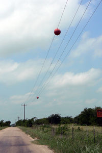  @ Buffalo Chips Airpark Airport - Buffalo Chips Airpark - Private field - The olny way to recognise the airfield is the balls on the power line - does not seem to be currently in use. - by Zane Adams