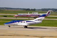  - Falcon taxiing out to Runway 27, Eagle Flight Taxiing in to the gate after landing Runway 27 - by Glenn E. Chatfield