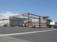  - New large hangar with electrical and plumbing under construction.  - by Doug Robertson