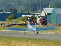  - airport improvement machinery on taxiway - by Wolf Kotenberg