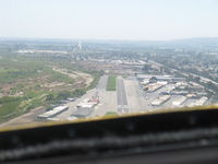  - On final for Rwy 22 in N406L - by Doug Robertson