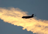  - Skywest CRJ-200 Departs RWY 24L KLAX with a southbound turn at the coast at sunset. - by Mark Kalfas