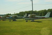  - Three vintage Cessna's at the Father's Day fly-in. - by Megan Simmermon