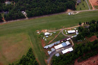  - Laneys Airport, looking south-east.  An Allegro airplane can be seen between the hangars at the bottom of the photo. - by Jamin