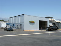  - New Hangar Under Construction. Bi-Fold hangar door installed. - by Doug Robertson