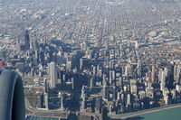  - United Airlines Ted Airbus A320-232 N458UA on approach to 27L KORD with a view of the Windy City.. - by Mark Kalfas