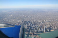  - United Airlines Ted Airbus A320-232 N458UA on approach to 27L KORD with a view of the Windy City.. - by Mark Kalfas